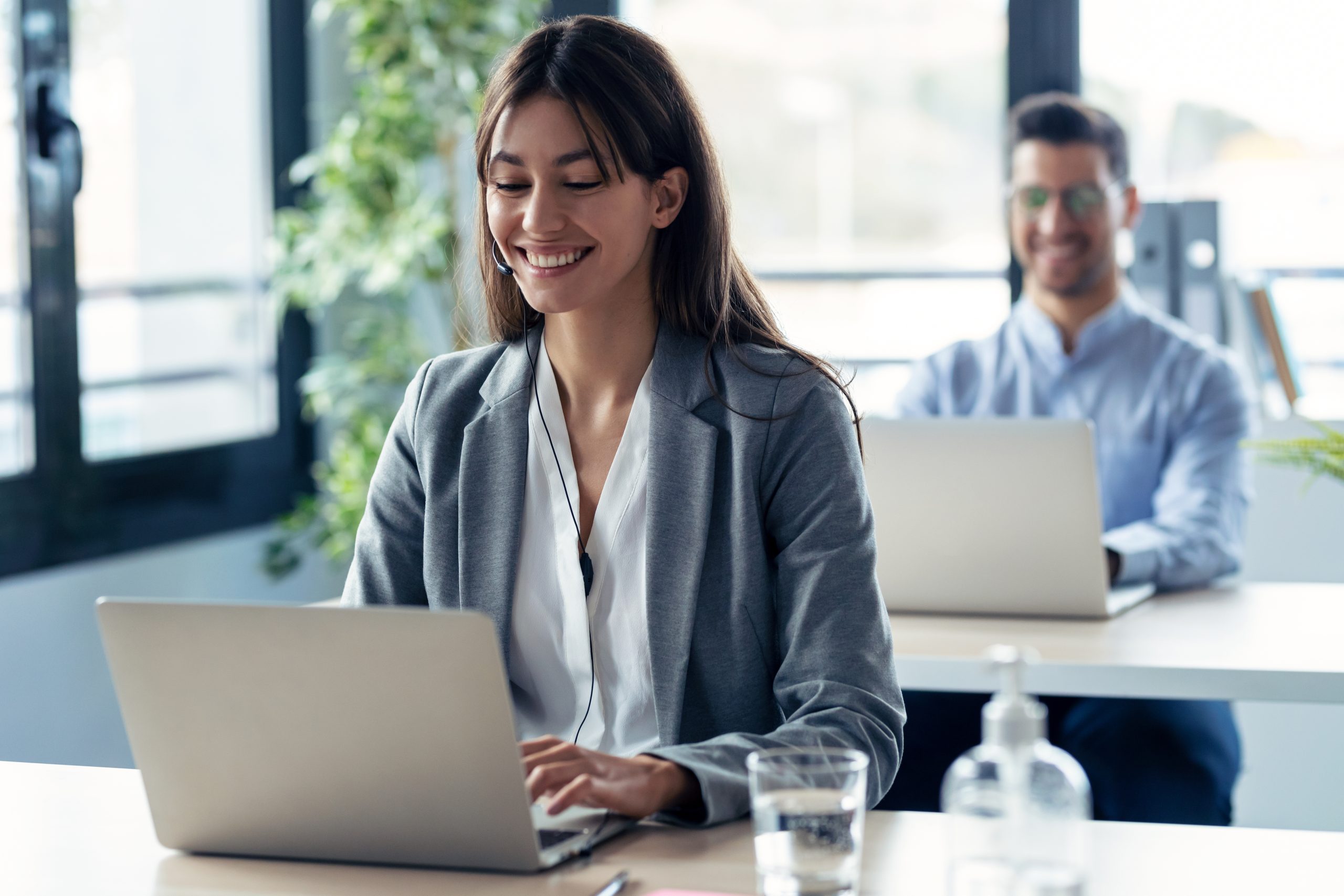 Shot of attractive smart business team working while doing a video call with diverse colleagues on online briefing with laptop in the office.