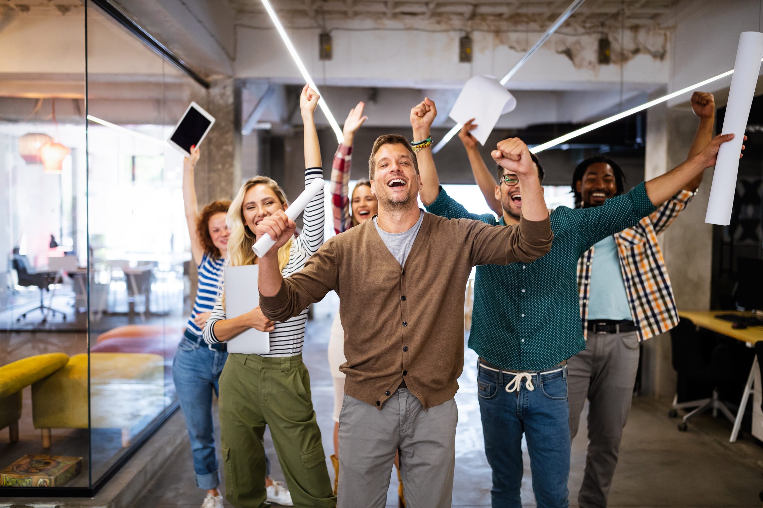 Successful company with happy employees colleagues in modern office